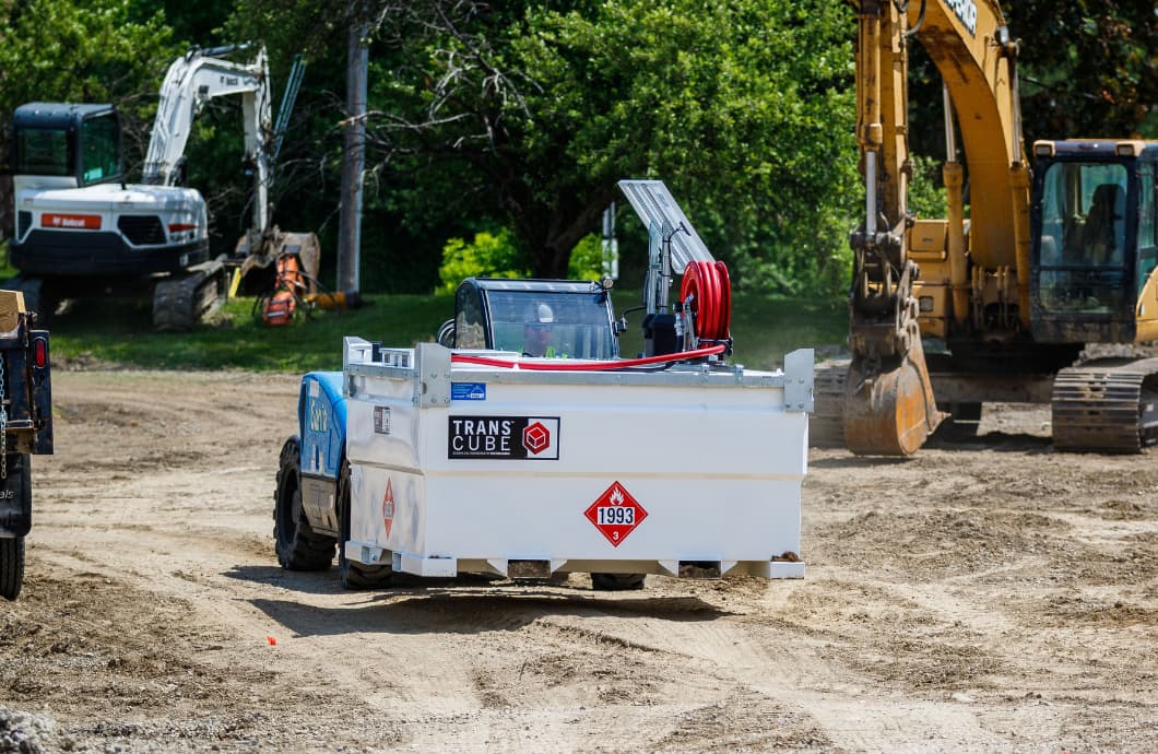 western global transcube tank being moved with a telehandler