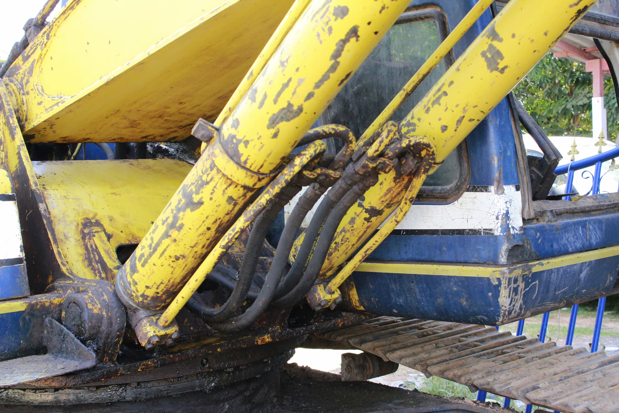 rusty and leaking hydraulics on used construction equipment for sale