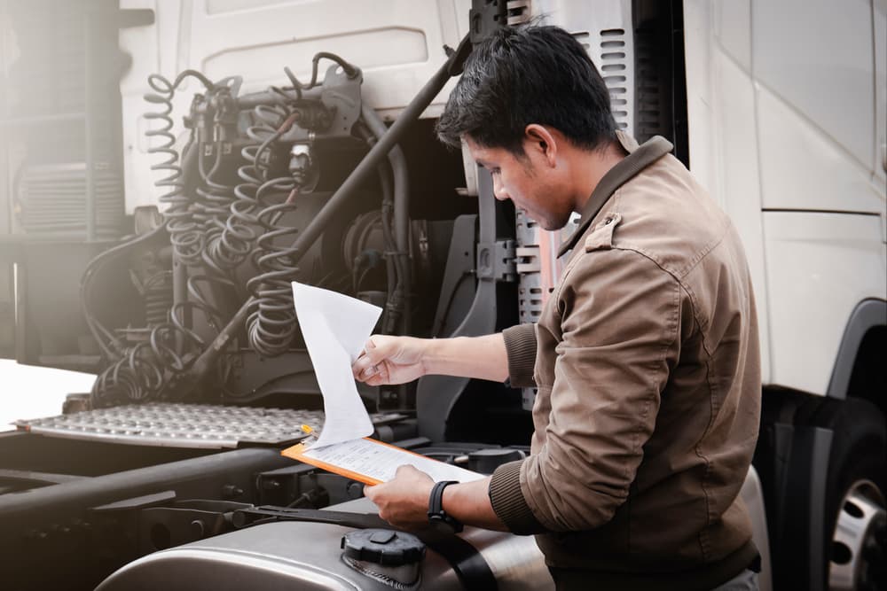 man inspecting truck before purchase