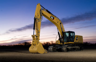 Cat 36-ton size class excavator at night