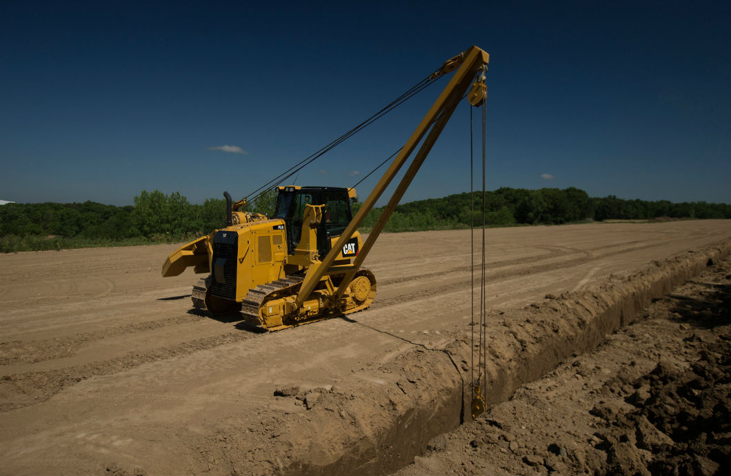 Cat PL61 Pipe Layer in Action