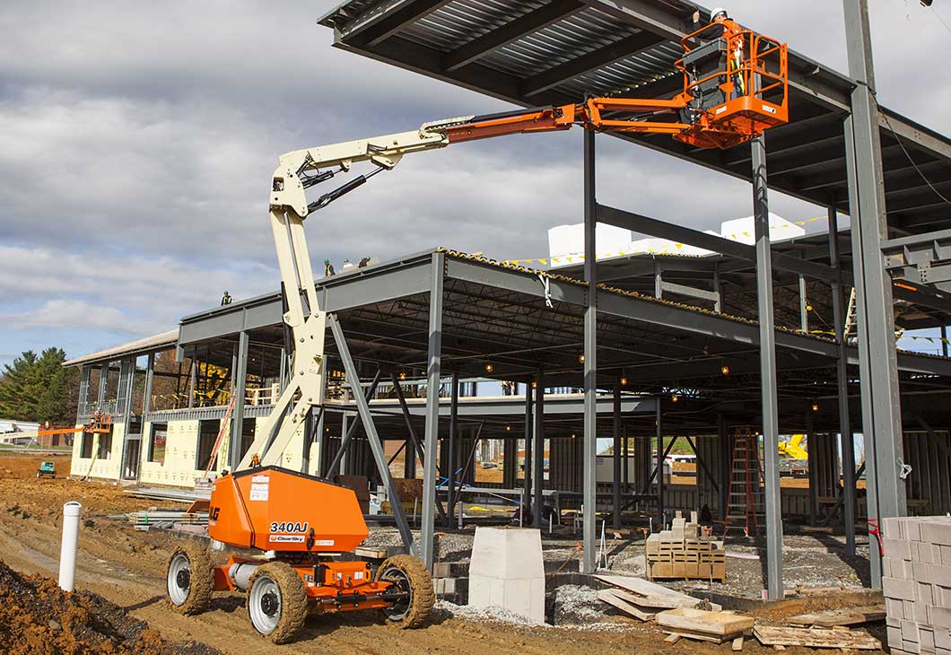 JLG 340AJ Articulating Boom Lift Doing Construction